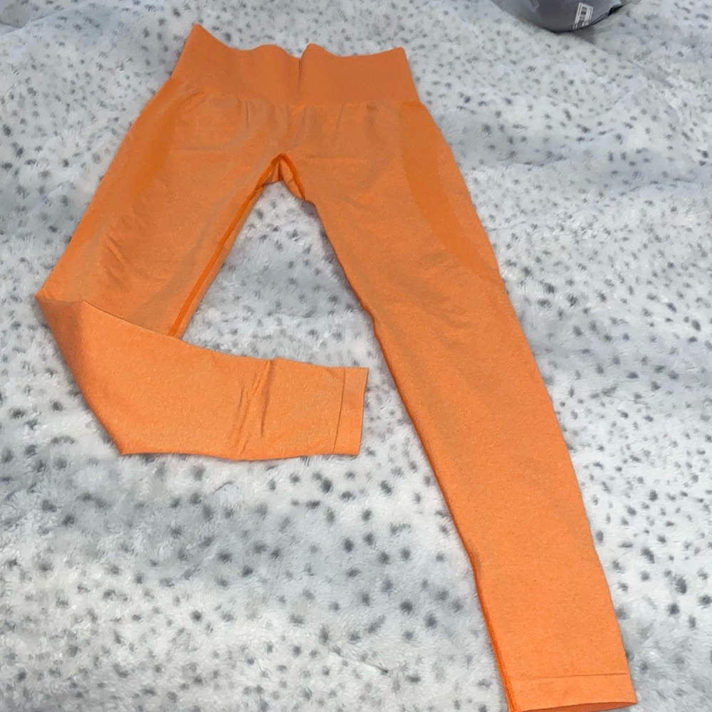 NVGTN orange leggings